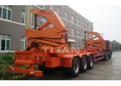 How do you attach a shipping container to a trailer?