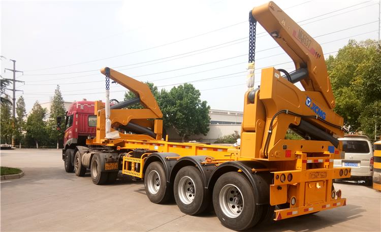 20 Ft Self Loading Trailer for Sale In Cayman Islands20 Ft Self Loading Trailer for Sale In Cayman Islands  Congratulations to our Cayman Islands customers, his 2 sets 20 ft self loading trailer for sale has passed the test.  TITAN factory professionals inspected the newly completed 20 ft self loading trailer for sale and fully complied with the inspection standards. Today the factory is packing, ready to send.  TITAN 20 ft self loading trailer for sale is a type of specialized semi-trailer that is used to hoist and transport standard containers over long distances. Also known as a container side loader, this trailer is basically used for container transfer. It comprises lift modules or cranes that are installed on the trailer chassis. These lifting components can also be fitted onto a sub-frame usually mounted on a truck.  20 Ft Self Loading Trailer for Sale In Cayman Islands20 Ft Self Loading Trailer for Sale In Cayman Islands  Application of TITAN 20 ft self loading trailer for sale TITAN 20 ft self loading trailer for sale are becoming more and more popular. 20 ft self loading trailer for sale are designed to increase various productivity. You will be able to reduce transportation costs, increase profits and have a competitive advantage.TITAN 20 ft self loading trailer for sale includes 20ft self loader truck, 20ft and 40ft container side lifter trailer. The shipping tonnage is 16tons,21 tons,25tons, 37 tons, 40 tons, 45 tons for your choice.  Here are some details of the 20 ft self loading trailer for sale, you can learn more about the side lifters.  TITAN 40ft container self loading trailer is used for loading and unloading 20ft and 40ft containers.TITAN 20 ft self loading trailer for sale adopts wireless remote control technology, loading container just takes 10 mins.  20 Ft Self Loading Trailer for Sale In Cayman Islands20 Ft Self Loading Trailer for Sale In Cayman Islands  Lack of space is a recurrent feature of today’s logistics world. Double stacking of containers can be a very useful and economic solution. TITAN 20 ft self loading trailer for sale can double stack two high cube containers on the ground without chain shorteners. It avoids investing in specific equipment.   TITAN 20 ft self loading trailer for sale equipped with Power take off (PTO) or Diesel APU, While typically the cranes are powered by a trailer-mounted diesel engine, the cranes are sometimes powered via a PTO from the truck head tractor.  The 20 ft self loading trailer for sale is used for lifting and carrying two 20ft containers or one 40ft container in the port, station, and freight yard, the trailer’s hydraulic system power is from PTO in tractor truck, it can be operated both wireless remote control and manual operation.  20 Ft Self Loading Trailer for Sale In Cayman Islands20 Ft Self Loading Trailer for Sale In Cayman Islands  Business success often depends on existing tools or technologies. In terms of container loading, several loaders and trucks do the job well. However, 20 ft self loading trailer for sale are not only competent but container loader for sale is also more efficient than other more traditional loaders.  Saving time spent on loading containers can reduce the cost per trip. With the development of international trade, the use of containers is increasing, so the container shipping industry is also developing rapidly, and the methods of container shipping are also changing. This also makes the use of side cranes particularly important.  20 Ft Self Loading Trailer for Sale In Cayman Islands20 Ft Self Loading Trailer for Sale In Cayman Islands