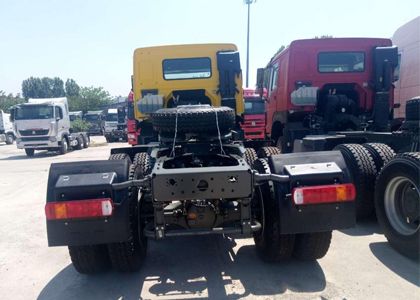 Which way can reduce the height of the truck trailer 