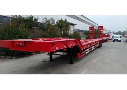 What are the uses of low bed loader semi-trailers?